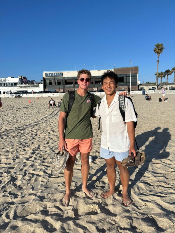 Jared Tam with Patrick Ford on beach