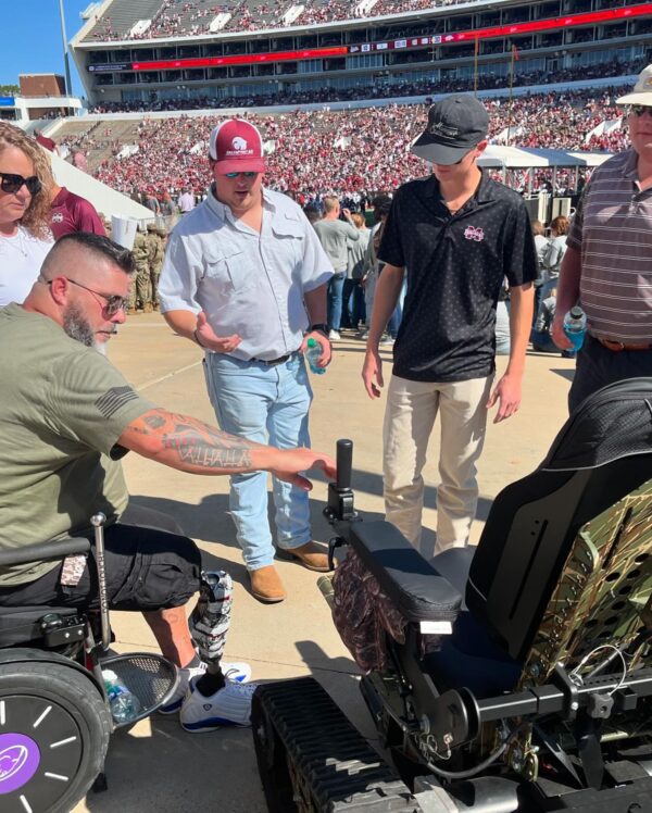 veteran getting into track chair