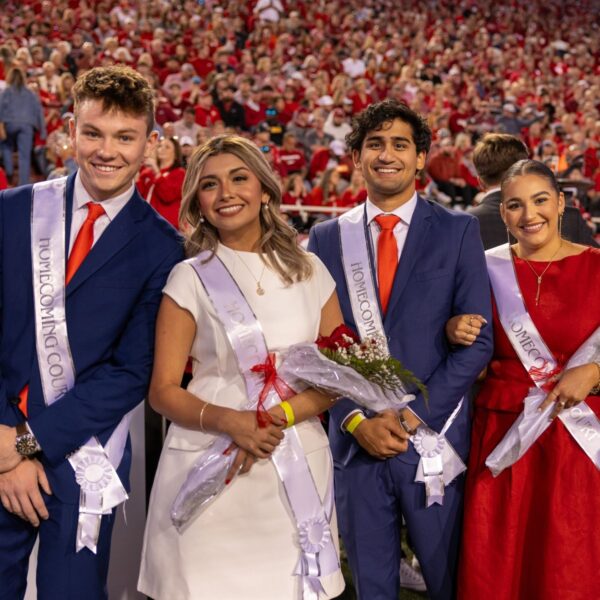 two men and two ladies on homecoming court