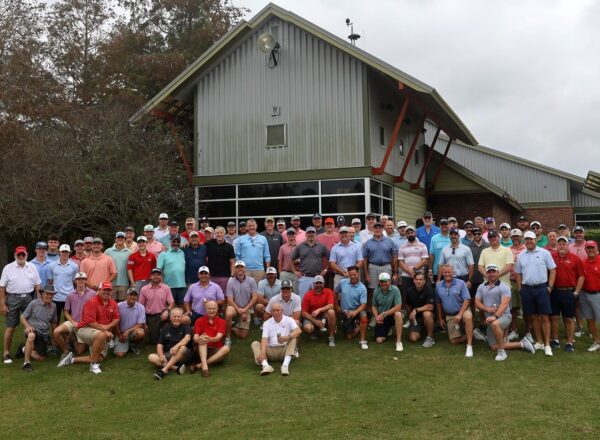 large group photo of men at golf course