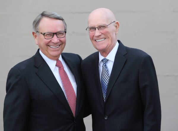 two men in suit and ties