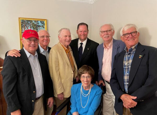 men standing with widow