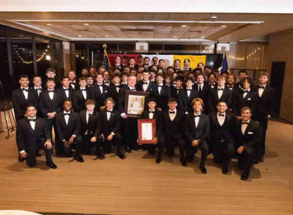 group of young men in tuxes