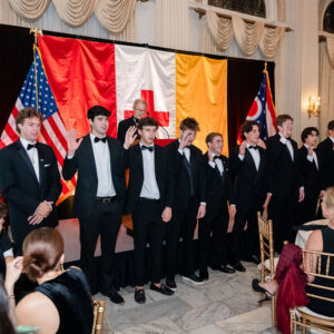 young men taking oath of office