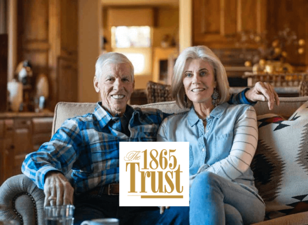 man and wife with 1865 Trust logo